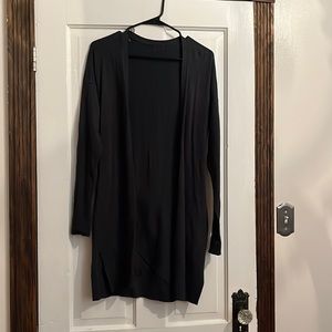Worn once xs cardigan with back detail, beautiful rich green/blue color